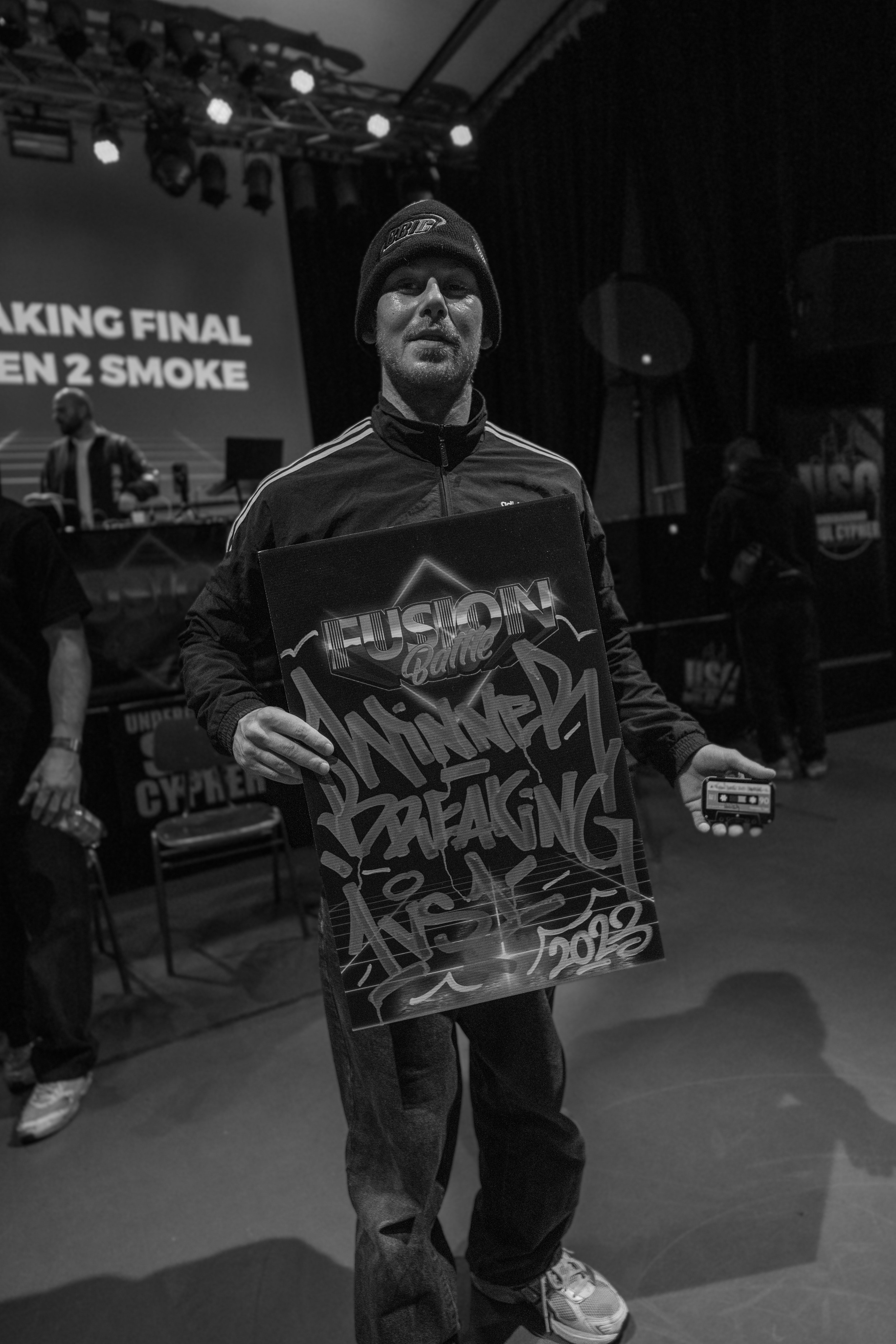 Breaking 1v1 Winner at Fusion Battle holding up his Winner Board