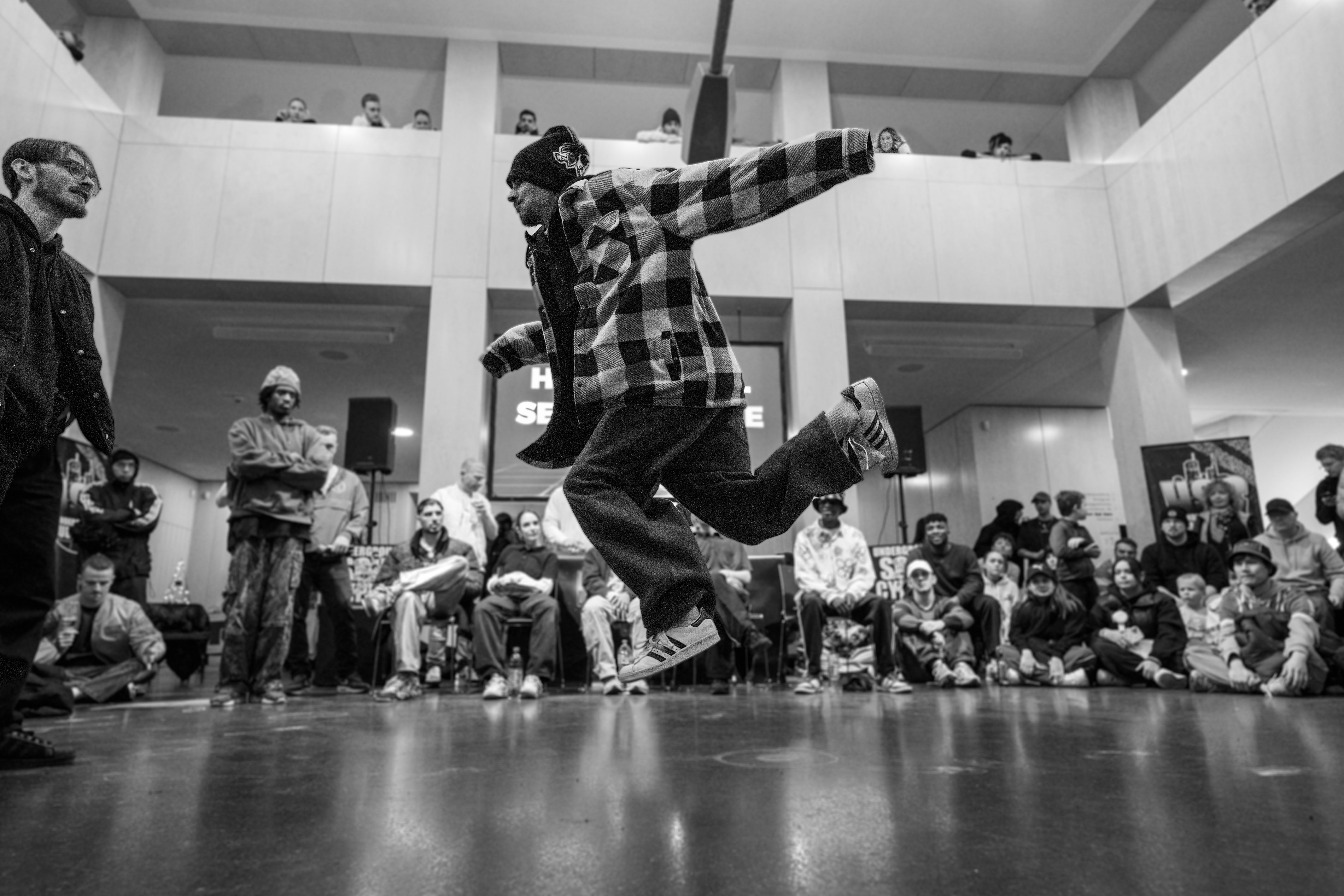 Hip Hop dancers in the Finals doing air poses